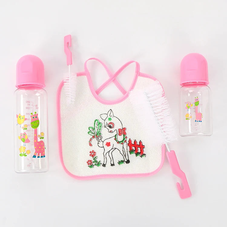 set de biberones con  babero